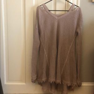 Long sweater with cut-outs